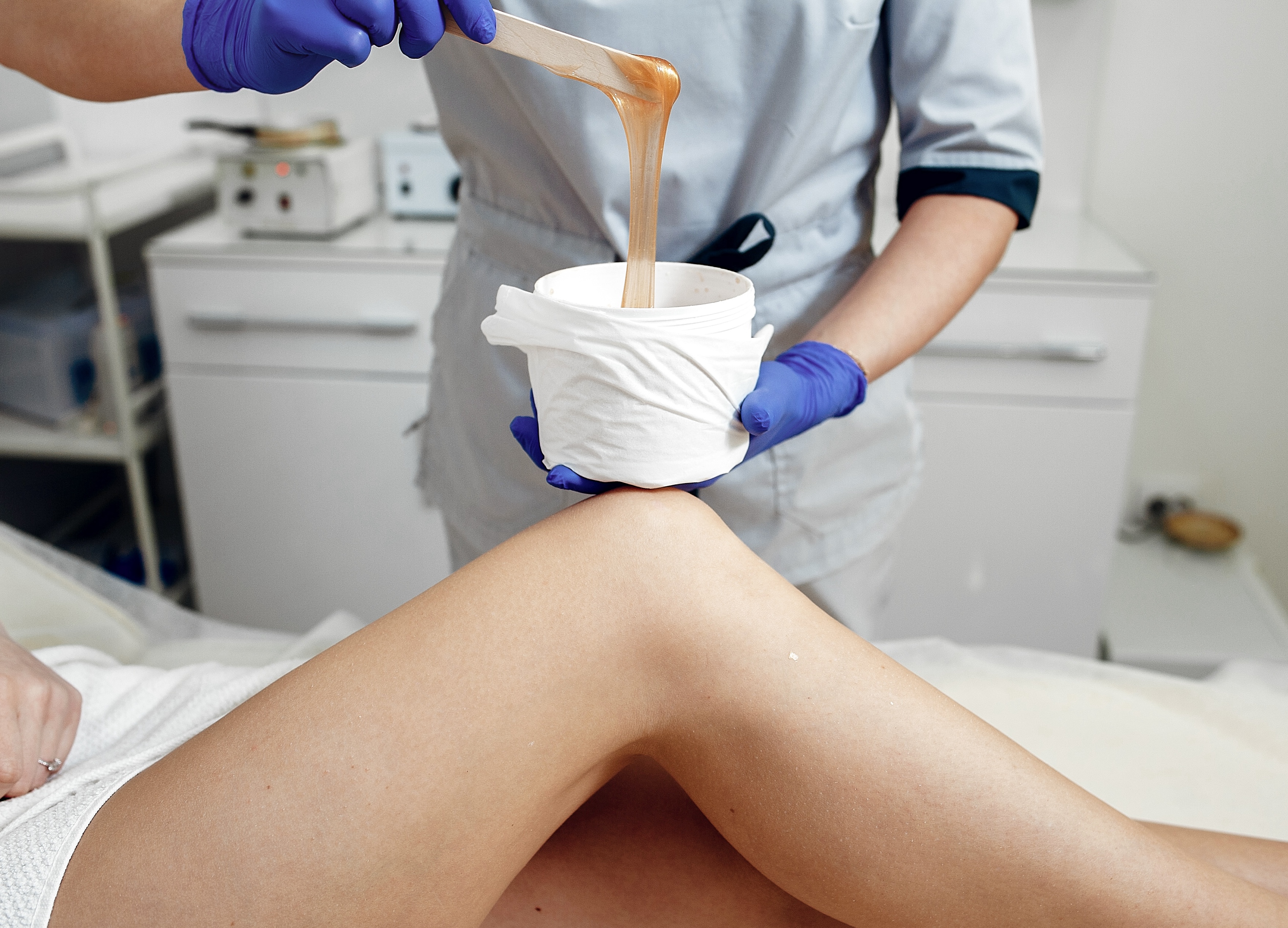 The Waxing Company website showcasing modern beauty and male grooming services with responsive web design by WA Designs.